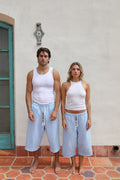 BELDI Azur shorts · couple facing camera