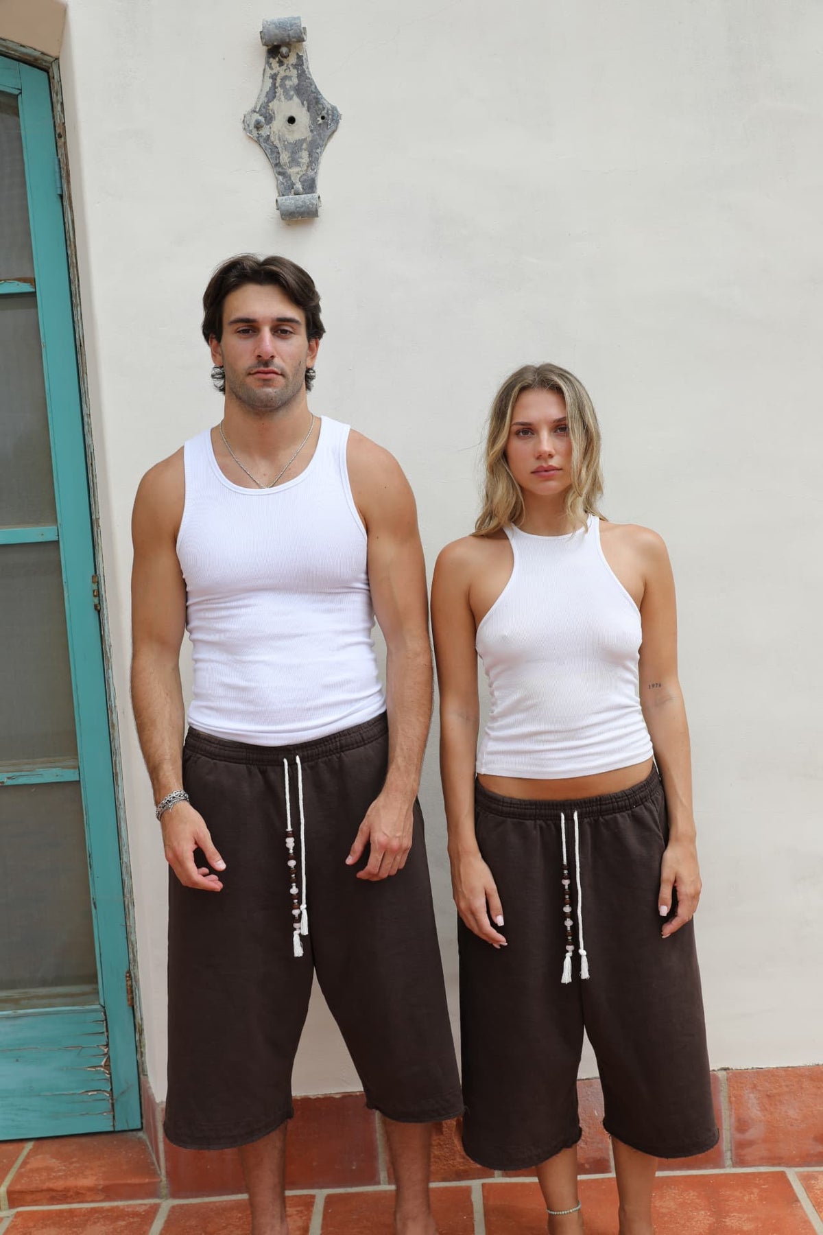 BELDI Mocha shorts · couple facing camera